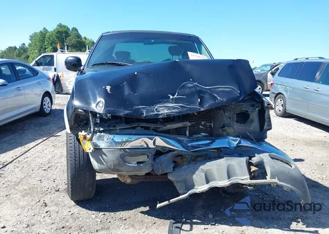 2001 Ford F150 z USA, uszkodzony, nr VIN 2FTRX18W71CA99637